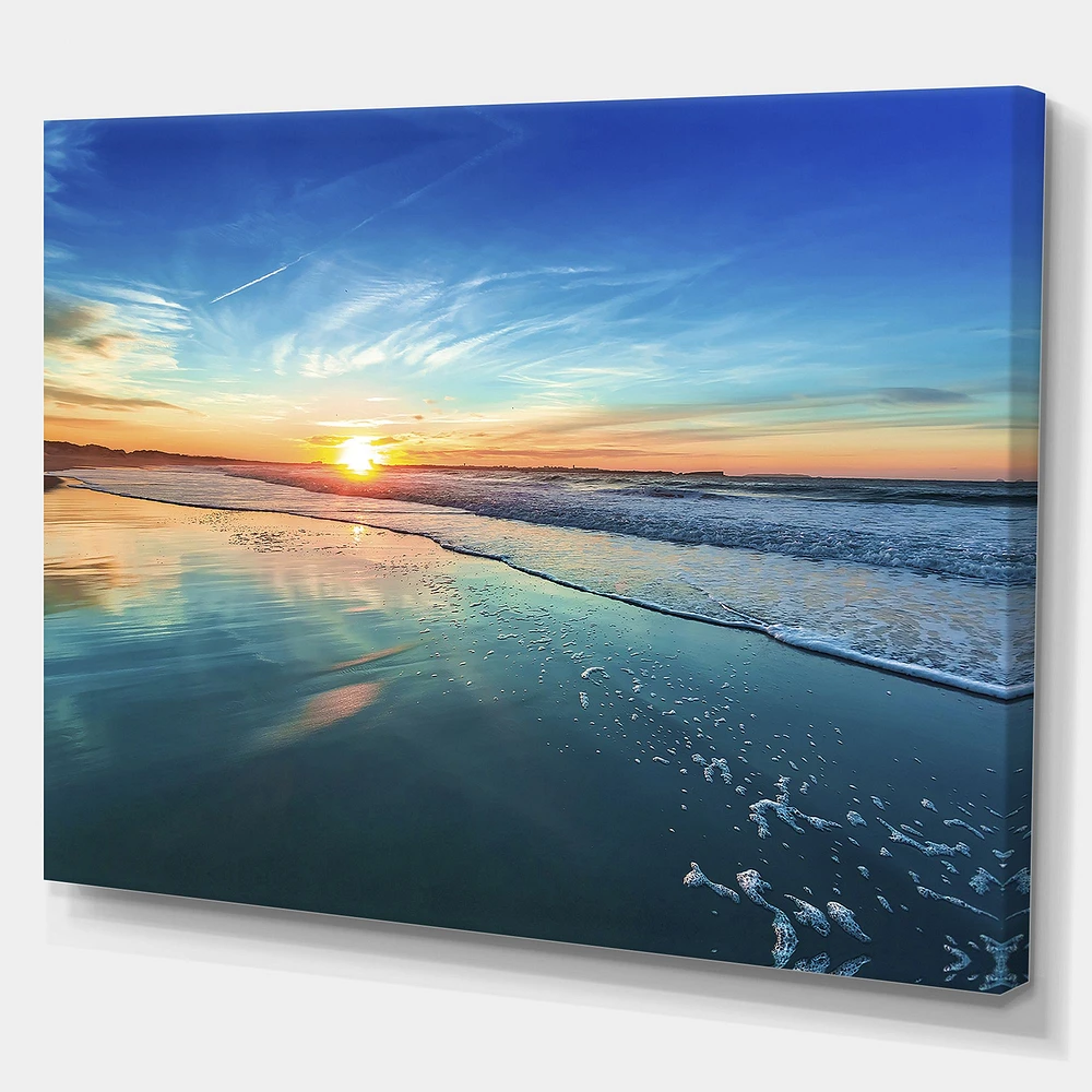 Blue Seashore with Distant Sunset  Canvas Wall Art