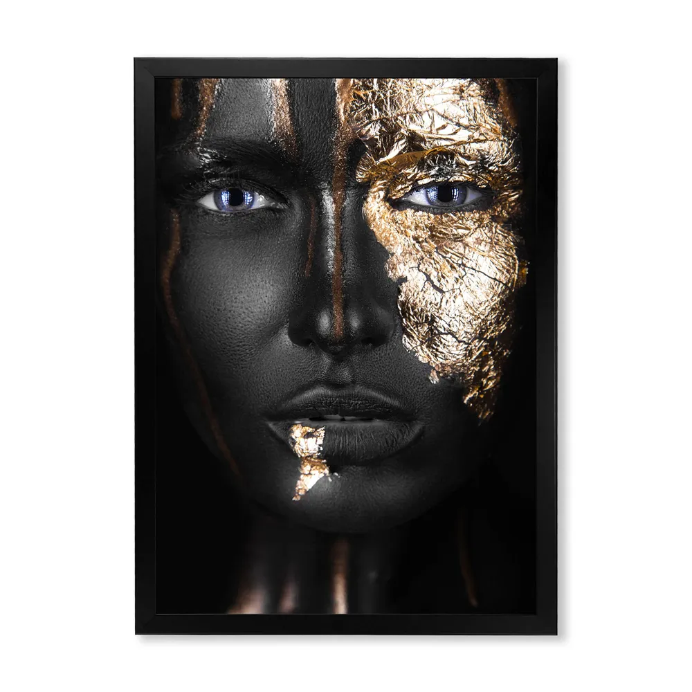 portrait of a afro american girl with gold makeup