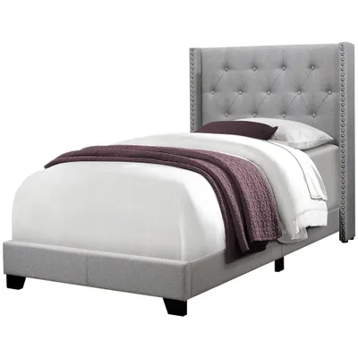 Luxurious bedframe with a wingback headboard