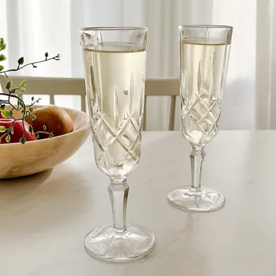 Noblesse set of 4 champagne flutes by nachtmann
