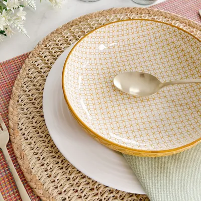 Yellow textured shallow bowl by bia