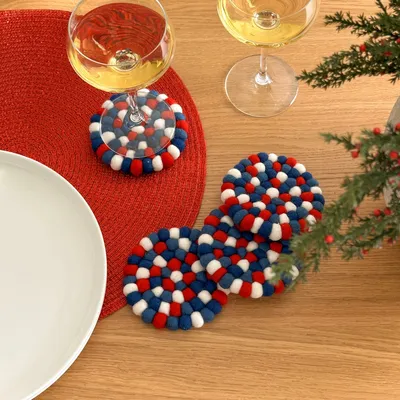 Wool felt ball coasters by torre & tagus - red blue white