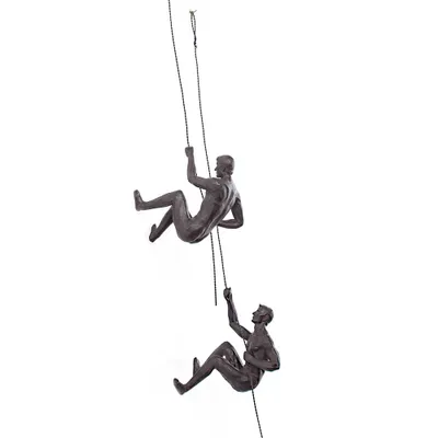 Set of 2 sculpted men climbing a wall - brown