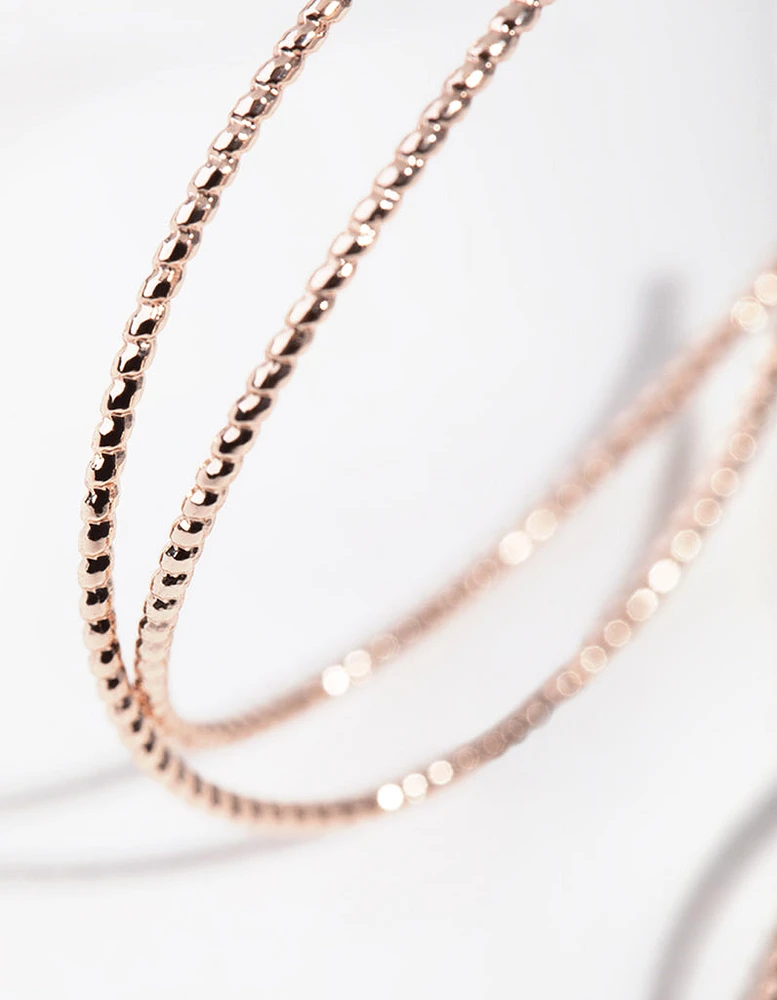 Rose Gold Crossover Hoop Earrings