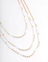 Gold Three Row Mixed Disc & Facet Bead Necklace