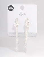 Silver Plated Cubic Zirconia Baguette Knot Drop Earrings