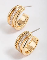 Gold Plated Cubic Zirconia Baguette Twisted Hoop Earrings