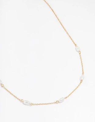 Gold Oval Pearl Station Necklace