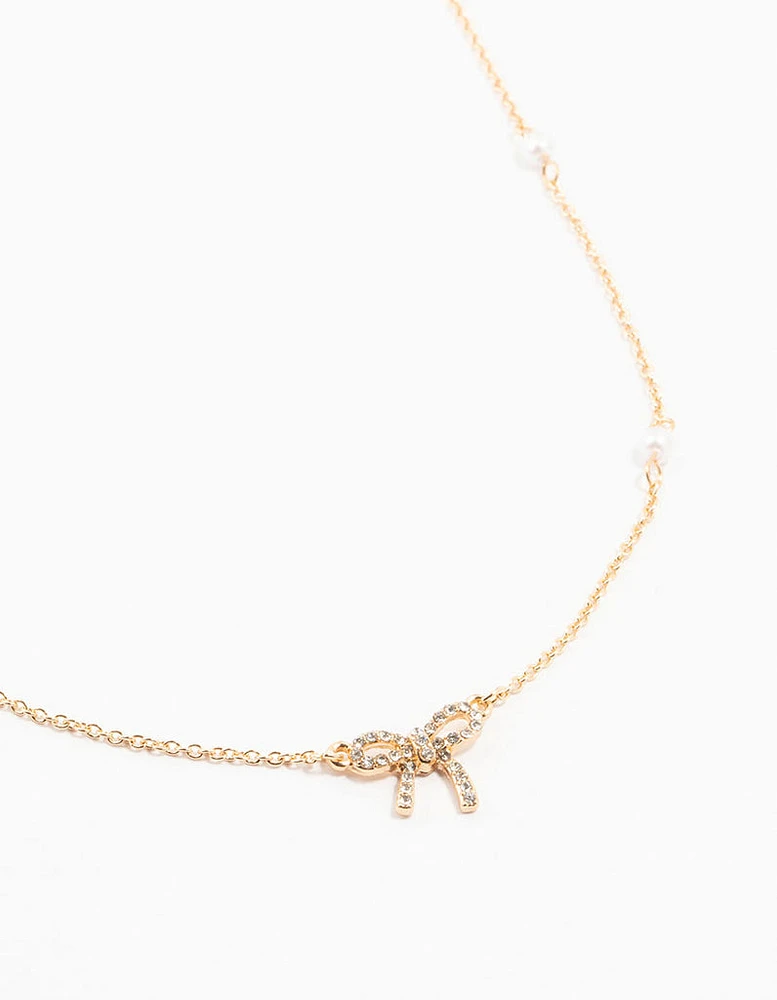 Gold Plated Station Pearl Diamante Bow Pendant Necklace