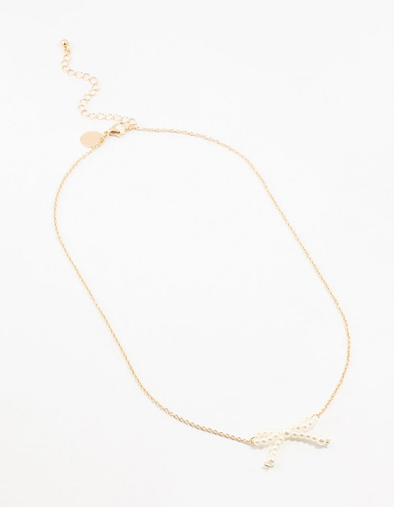 Gold Pearl Bow Necklace