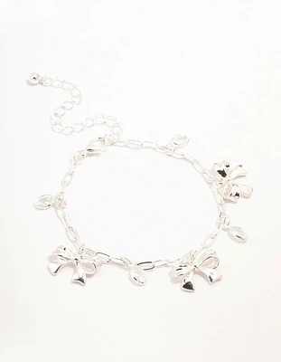 Silver Plated Alternating Cubic Zirconia & Bow Charm Bracelet