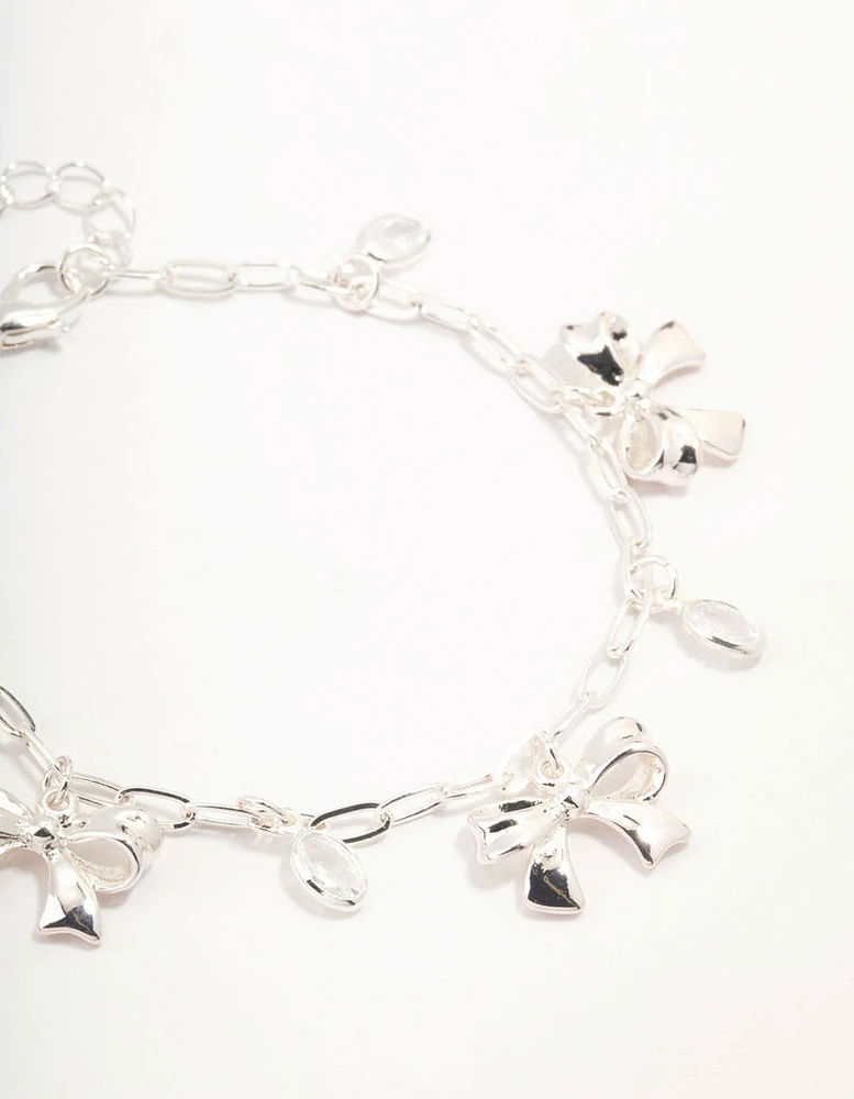 Silver Plated Alternating Cubic Zirconia & Bow Charm Bracelet