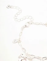 Silver Plated Alternating Cubic Zirconia & Bow Charm Bracelet