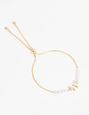 Gold Plated Cubic Zirconia Bow & Pearl Toggle Bracelet