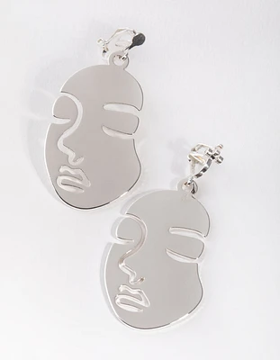 Silver Cutout Face Clip Earrings
