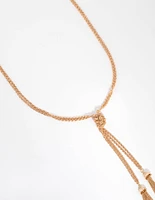 Long Gold Knot & Tassel Necklace