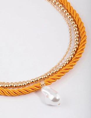 Gold Layered Orange Coloured Rope Pearl Necklace