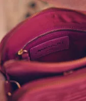 Mini sac matelassé en cuir velours fuchsia Flavie
