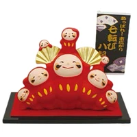 Darumas Spreading Out With Display Base Ceramic Ornament