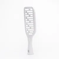 Double-faced vegetable grater with a standable handle