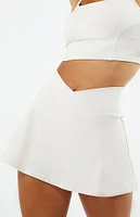 PAC 1980 WHISPER Active Ivory Crossover Front Mini Skirt
