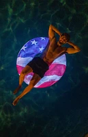 PoolCandy Inflatable Illuminated LED Stars & Stripes Pool Tube