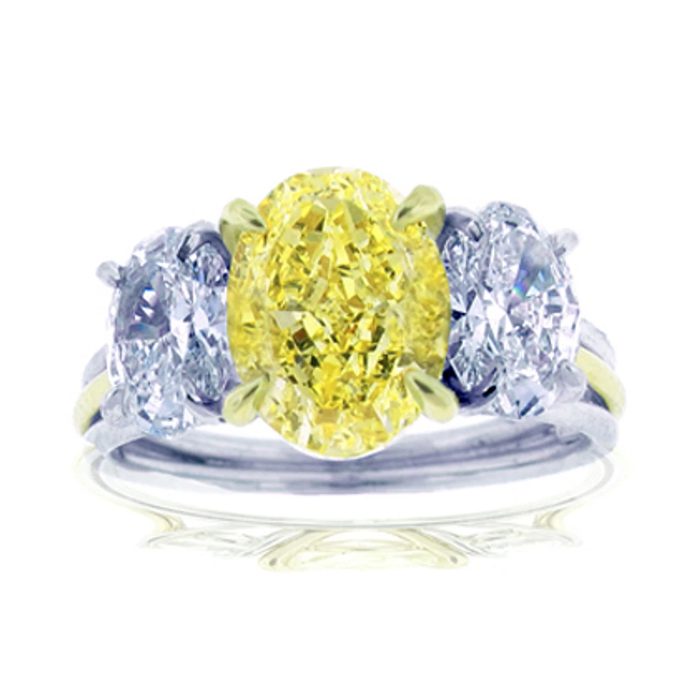 Platinum oval canary diamond ring