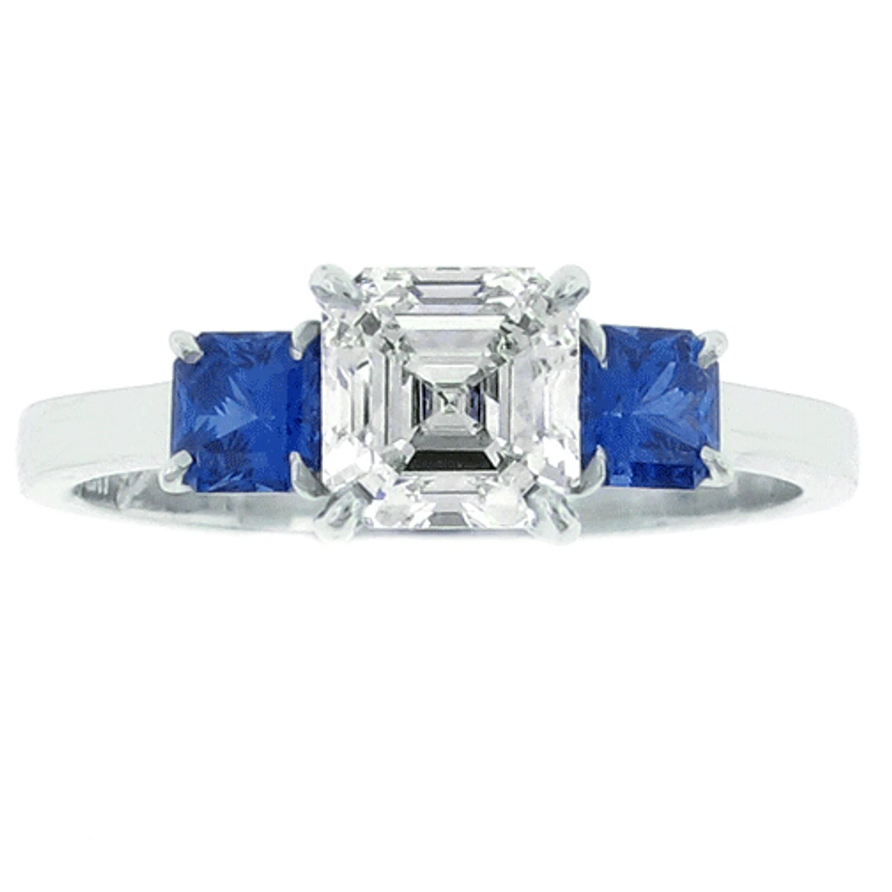Asscher Cut diamond and sapphire Three stone Ring