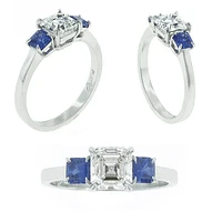 Asscher Cut diamond and sapphire Three stone Ring