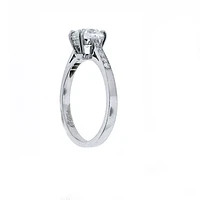 Cushion cut diamond cathedral solitaire