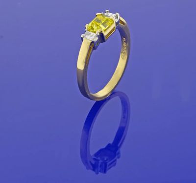 .74 Carat Vivid Yellow Internally Flawless Diamond Three-Stone Ring