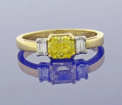 .74 Carat Vivid Yellow Internally Flawless Diamond Three-Stone Ring