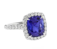 Tanzanite and Diamond Halo Ring by Pampillonia