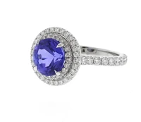 Platinum Tanzanite and Double Diamond Halo Ring by Pampillonia