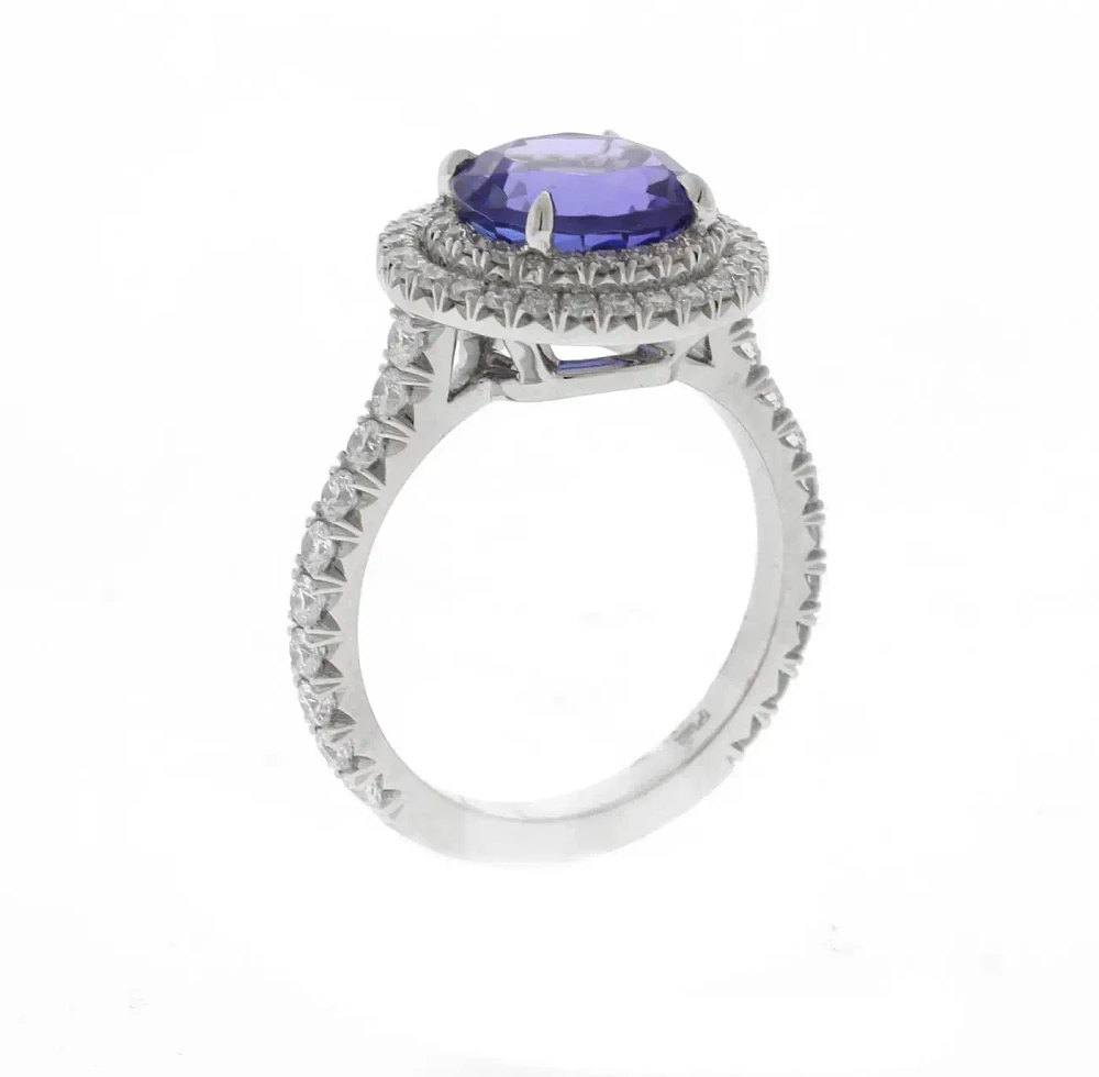 Platinum Tanzanite and Double Diamond Halo Ring by Pampillonia