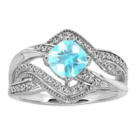 Ring with Blue Topaz and Created White Sapphire in Sterling Silver