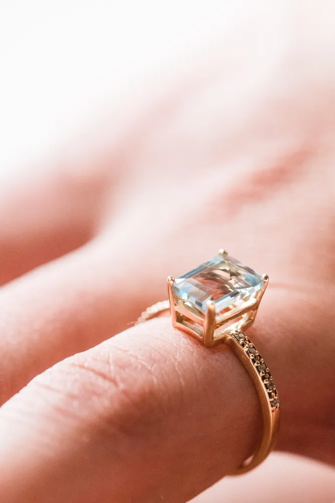 Ring with Aquamarine and .03 Carat TW of Diamonds 10kt Yellow Gold