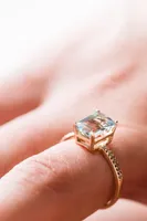 Ring with Aquamarine and .03 Carat TW of Diamonds 10kt Yellow Gold