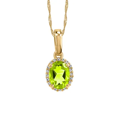 Pendant with .06 Carat TW of Diamonds and Oval Peridot in 10kt Yellow Gold with Chain