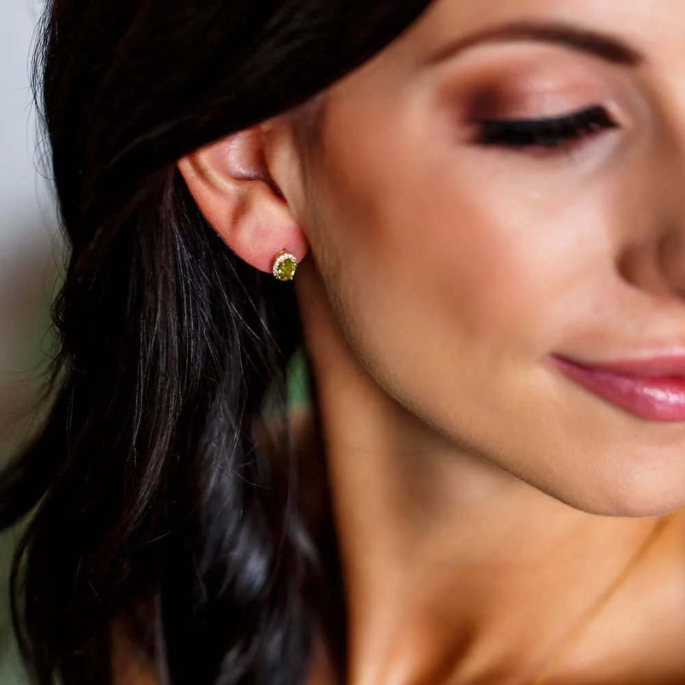 Earrings with .10 Carat TW of Diamonds and Oval Peridot 10kt Yellow Gold