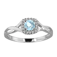 Ring with Aquamarine and .08 Carat TW of Diamonds 10kt White Gold