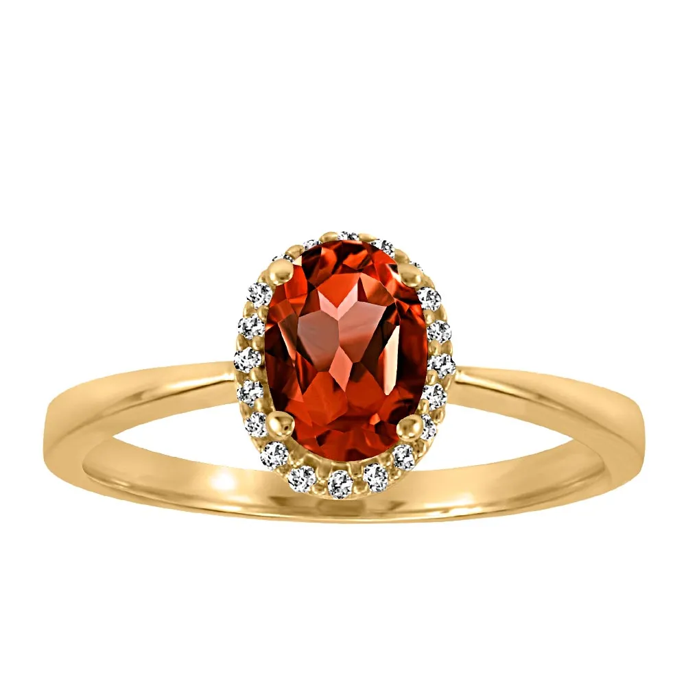 Halo Ring with Garnet and .06 Carat TW of Diamonds in 10kt Yellow Gold