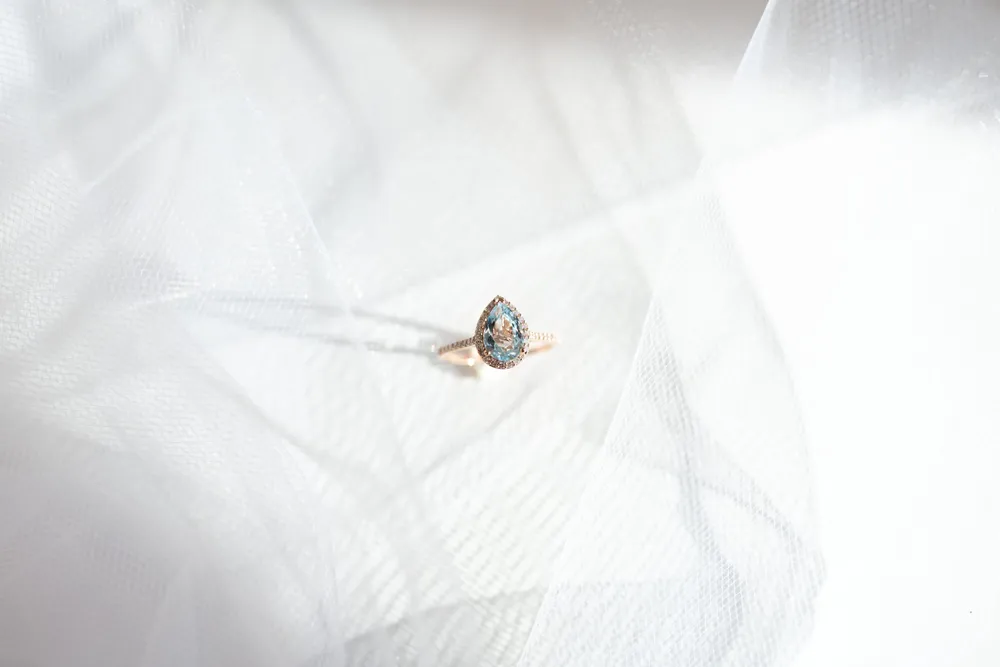 Ring with Aquamarine and .21 Carat TW of Diamonds in 14kt Rose Gold