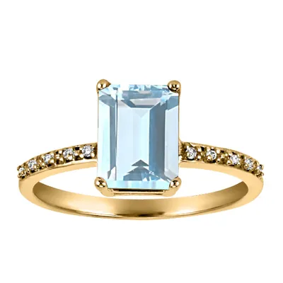 Ring with Aquamarine and .03 Carat TW of Diamonds 10kt Yellow Gold