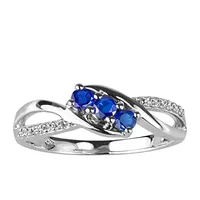 Ring with Blue Sapphire and .06 Carat TW of Diamonds in 10kt White Gold