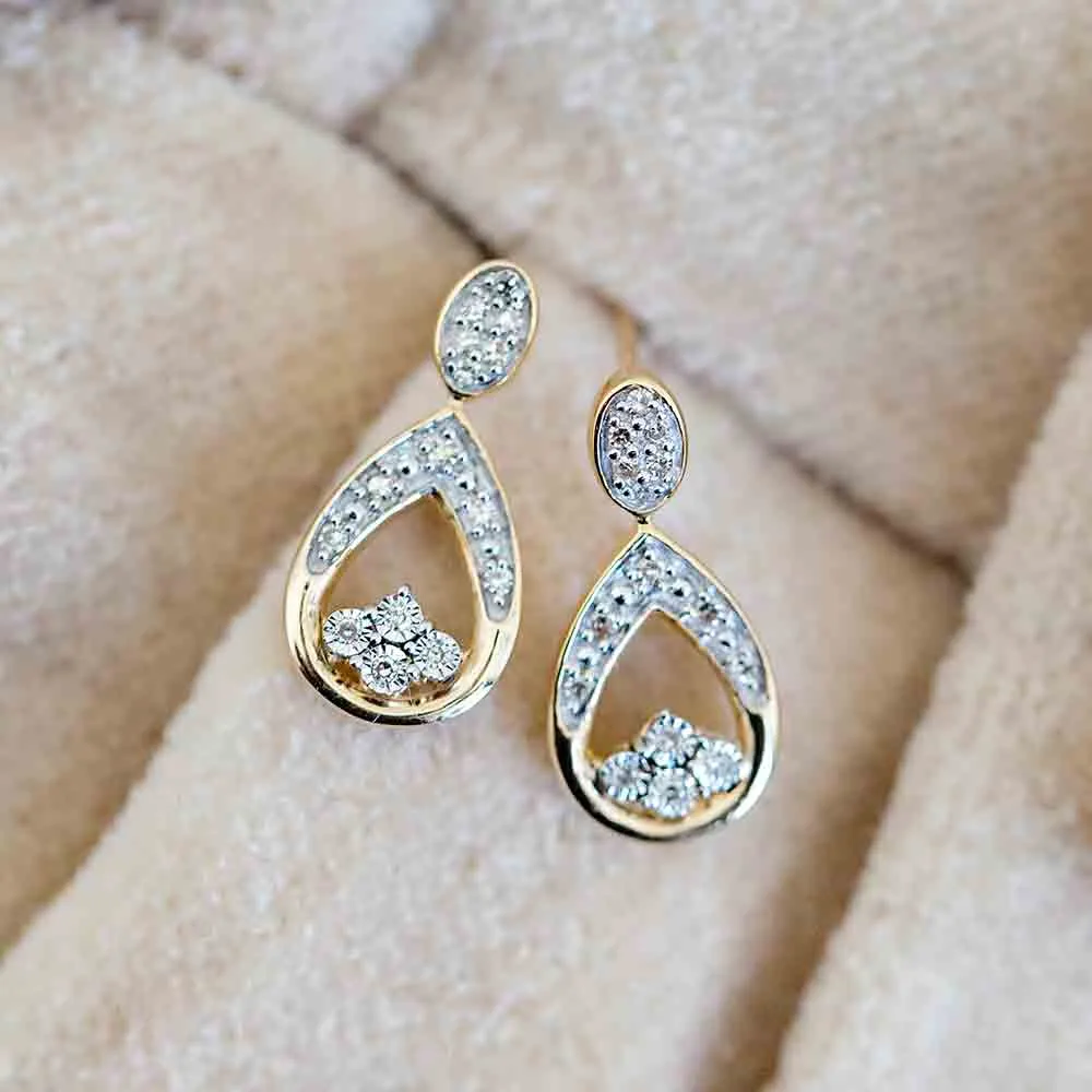 Earrings with .10 Carat TW of Diamonds in 10kt Yellow Gold