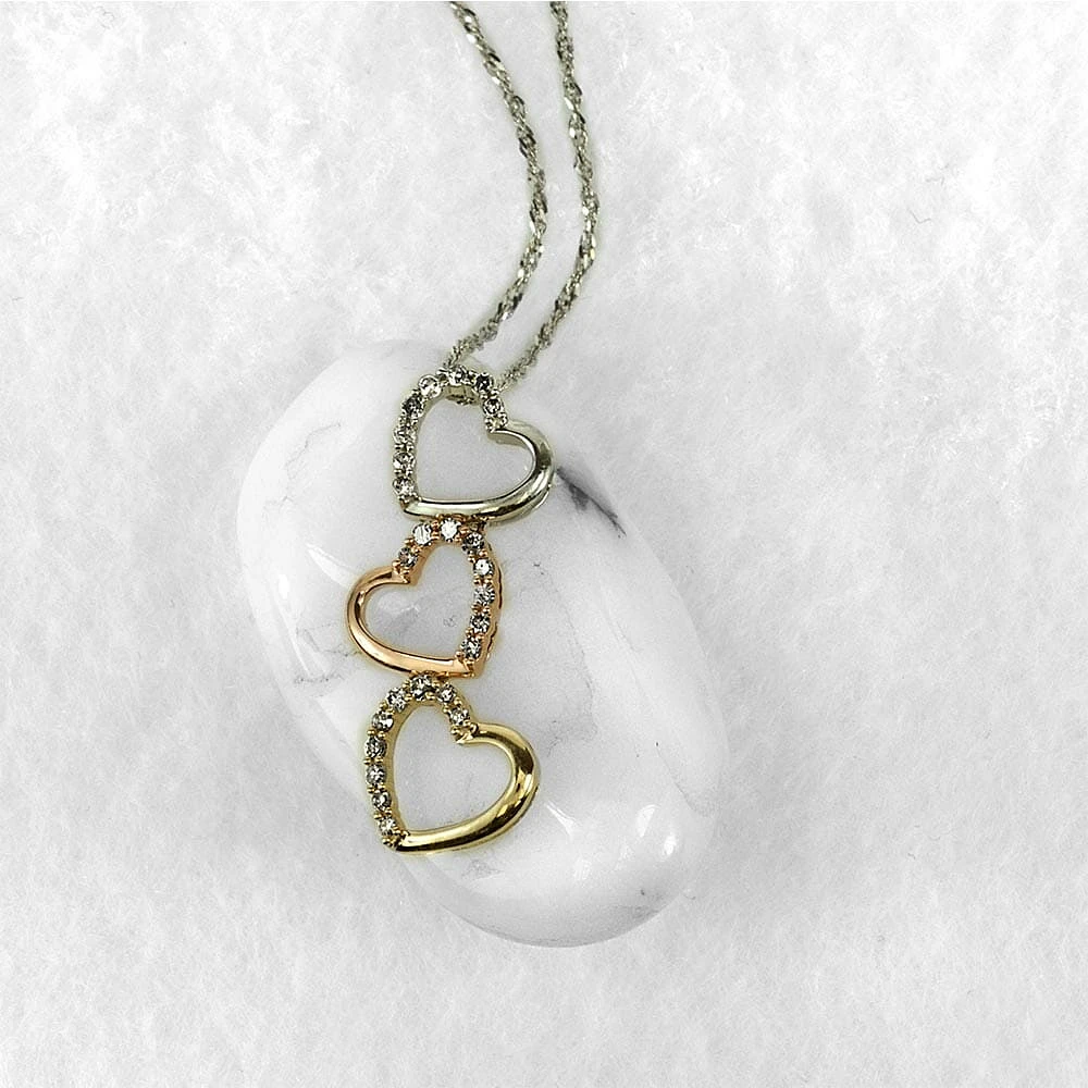 3 Heart Pendant with .20 Carat TW of Diamonds 10kt White Yellow and Rose Gold Chain