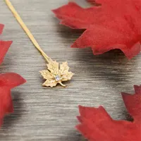 Yellow Gold and Diamond Maple Leaf Pendant with Chain