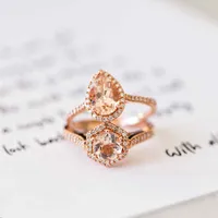 Ring with Morganite and .21 Carat TW of Diamonds 14kt Rose Gold