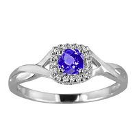 Ring with Tanzanite and .08 Carat TW of Diamonds in 10kt White Gold